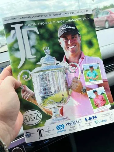 Justin Thomas Junior Championship program in hand